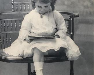 Antique photograph of reading child