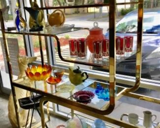 Display shelf with mid century and vintage glass, pottery, ceramics