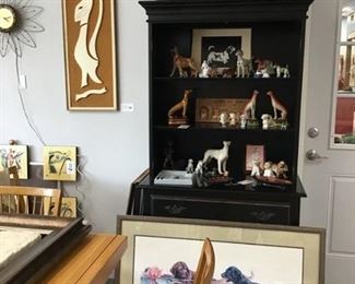 Secretary bookcase/shelf.  Doors are on floor to left. Dog art