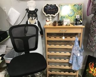 Wine rack, dog waiter stand sign, office chair, aprons, Art