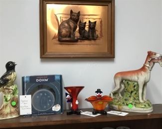 Murano clowns, staffordshire, bird figurine on book shelf