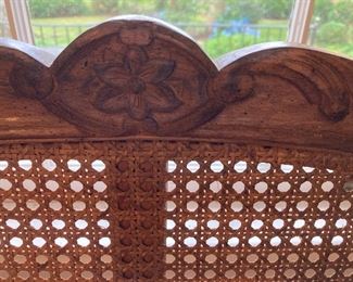 Detail of bench carving and cane