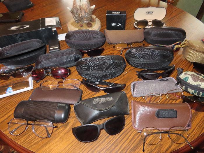 Nice collection of sunglasses - Lots of Oakleys!!