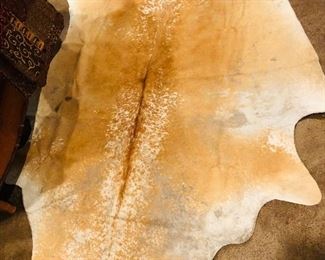 $195, cow hide rug