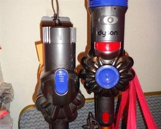 pair of these dyson vacs