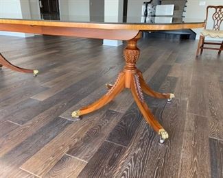 Table dining table extends from 7-' at it's smallest to 119.5"  with 3 leaves in $1999