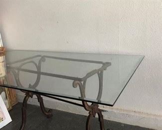 Wrought iron base and 1/2" glass top table  5' X 3' X 27.5" $100