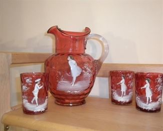 Antique Mary Gregory cranberry pitcher and tumblers