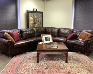 Thomasville furniture. Leather sectional from the Benjamin collection. Nail head trim, bun feet, super condition, made in the USA.