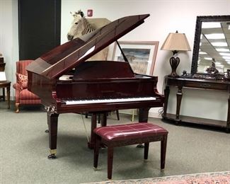 Baldwin baby grand piano. Deep mahogany high-gloss finish. Professionally moved. 5 feet long, 58 inches wide.