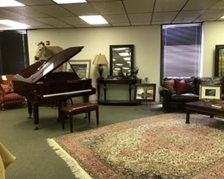 Baldwin baby grand piano. Deep mahogany high-gloss finish. Professionally moved. 5 feet long, 58 inches wide.