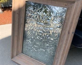 Very large imported mirror. Heavy light wood frame as shown. The mirror is old and there has this "Crinkled" effect. It looks more like an abstact piece of art than a mirror but still beautiful Measures approximately 4 1/2 feet tall. Heavy. $225