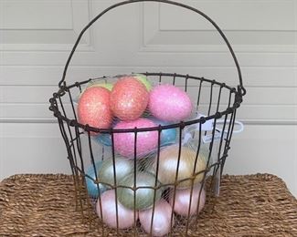 Old wire egg collecting basket with two sets of brand new plastic eggs inside. Measures 8" x 6" - $8
