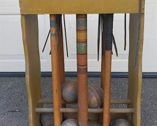 Vintage Croquet set. Nice patina on mallets and wood balls from age. Stand included. $28