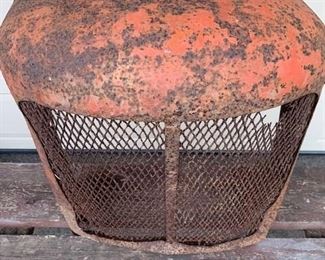 Rusty old car grill which are great for hanging. Some people put lights behind the grill and hang it on the wall for a light fixture. This one is rusty orange and a great piece. Second photo shows other angle. Measures a large 26" x 24" x 11".  $59
