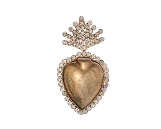 Ex Voto, Metal heart surrounded by distressed crystals. Measures approximately 5 1/2 High. Opens with hinge where you are to put your special intention inside and hang it in your home until the intention is answered then tradition says to give it to someone else in your family. Immaculate Heart of Mary insignia on front, Sacred Heart crown top.  $42