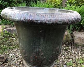 Glazed green pot - hairline crack on side does not effect integrity of pot. 22” round x 19” h $40