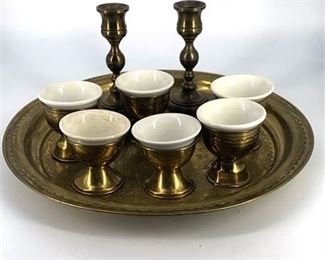 9 piece vintage brass and porcelain Kiddish, Cup, Tray and Candlesticks. Tray measures 12" round. Slight crazing on one of the cups. Made in Israel.  $12