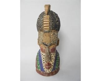 Nice vintage hand carved and painted tribal head figure, the piece is in good condition and stands 17'' tall $22
