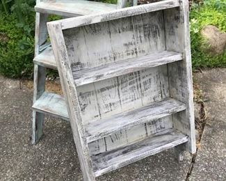 Great barn find. Chippy white wooden display shelf. Measures 27 1/2" x 18" wide and 4 1/2" deep. Ladder is available on sale in another photo. Shelf is $42