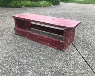 Large rustic red farm bench 26" long and 8 1/2" tall and 11" deep. $48