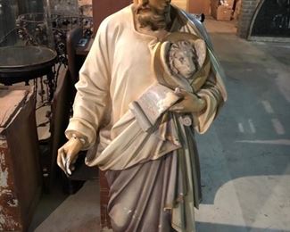 A very large church statue of St. John the Baptist. Stunning! Measures 53" high, 20" wide. It is muted in colors and old.  Chalkware. Expected wear from age. We have a close up photo in the next image for anyone interested. $750