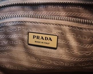 Prada Red Pebble Leather bag
 9.5”h  x 13.25“w  x 2”d	Asking  $120  