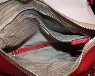 Prada Red Pebble Leather bag
 9.5”h  x 13.25“w  x 2”d	Asking  $120  