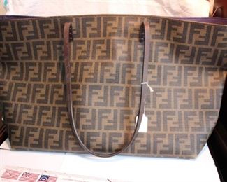 Fendi FF Logo Roll bag/tote in iconic Zucca coated canvas topped with slender double handles
 10.5”h x 20”w x 6”d
Condition: Great, gently used, minor wear to corners	    Asking  $750