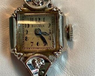 Vintage ladies 14k WG Bulova mechanical watch with 2 prong set diamonds, band is gold filled, 6.5”long
Working, keeping time	Asking  $150 