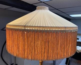 Italian style carved gilt wood floor lamp with fringed pleated silk shade, 3 light
Overall 70”h, shade bottom diameter is 22”             Asking  $650