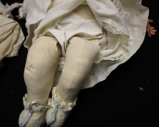 Antique AM (Armand Marseille) Baby Doll, Bisque head, eyes open & close, cloth body, cellulose hands with one finger missing, approx 17”, clothes are chewed but body is fine	$250
