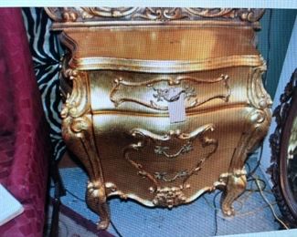 Gold Gilt Bombe Night Stand $315.00 (item located in storage, please contact if interested and we will arrange for the item to be on-site the day of the sale)