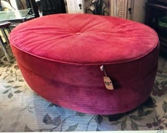 Velvet Upholstered Oval Cushion Top Ottoman $100.00 , (item located in storage, please contact if interested and we will arrange for the item to be on-site the day of the sale)