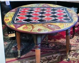Paint Decorated Side Table with Stylized Game Top $130.00 (item located in storage, please contact if interested and we will arrange for the item to be on-site the day of the sale)