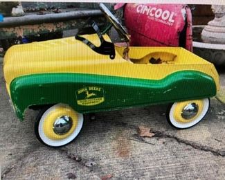 John Deere Gear Box Metal Peddle Car $450.00 (item located in storage, please contact if interested and we will arrange for the item to be on-site the day of the sale)
