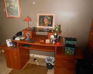 Very nice desk, on the left, holds the tower, right a drawer, and file drawer