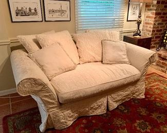 $495 "Domain" white damask slipcovered single cushion seat winged arm sofa.  Sold with 4 down pillows and two decorative polyfill pillows. 74.5"W x 39.5D x 27H.  Seat height 19"