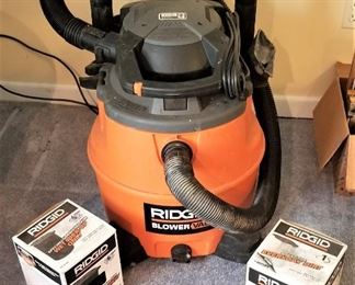 Lot #23  Rigid Blower Shop Vac with attachments and two filters  (wet/dirt)