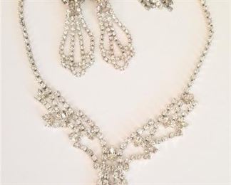 Lot #39  Rhinestone jewelry lot - "drippy" necklace and 2 pair clip earrings.
