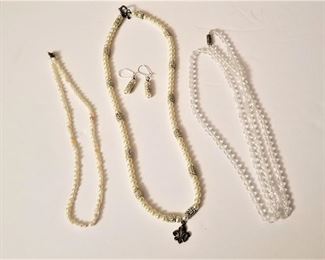 Lot #56  Pearl necklace lot - 1 freshwater pearls, one costume pearls with silverplate accents, one faceted clear bead necklace