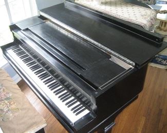 Ebony baby grand  Kimball piano