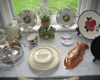 Plates with fruit motif and assorted dishware