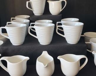 https://ctbids.com/#!/description/share/422442 Sant' Andrea Royal Porcelain: 6 creamers and 12 cups. "Prestigious heritage. Distinctive shapes. Exceptional craftsmanship. This elite European brand, established in 1990, unites modern themes with timeless classic design. Gracing prestigious tabletops all over the world, Sant’ Andrea is worthy of the most respected culinary establishments. Sant’ Andrea offers exceptional product collections across flatware, dinnerware, holloware and banquetware."