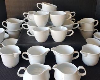 https://ctbids.com/#!/description/share/422461 Sant' Andrea Royal Porcelain: 24 cups, 4 creamers, 2 small creamers. "Prestigious heritage. Distinctive shapes. Exceptional craftsmanship.This elite European brand, established in 1990, unites modern themes with timeless classic design. Gracing prestigious tabletops all over the world, Sant’ Andrea is worthy of the most respected culinary establishments. Sant’ Andrea offers exceptional product collections across flatware, dinnerware, holloware and banquetware."