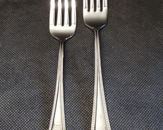 https://ctbids.com/#!/description/share/422482 Needlepoint/ Beaded Artistry by Oneida. Dinner Forks and Salad Forks. 18/8. 8 of each. New in plastic sleeves.