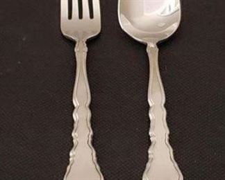 https://ctbids.com/#!/description/share/422469 "Satinique" Forks & Spoons By Oneida: 6 Spoons and 6 Forks. Subtle. Satiny. Sophisticated. This stainless flatware design inspires timeless beauty with its bright, delicately, sculpted border. A brushed, satin finish on the center panel contrasts nicely against the polished edges of the carved handle and the reflective tines and bowls. 18/10 Stainless Steel. Superb finish and pattern detail. Long lasting durability. 