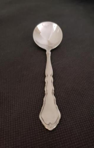 https://ctbids.com/#!/description/share/422434 "Satinique" Spoons By Oneida: 12 Spoons. "Subtle. Satiny. Sophisticated. This stainless flatware design inspires timeless beauty with its bright, delicately, sculpted border. A brushed, satin finish on the center panel contrasts nicely against the polished edges of the carved handle and the reflective tines and bowls. 18/10 Stainless Steel. Superb finish and pattern detail. Long lasting durability."