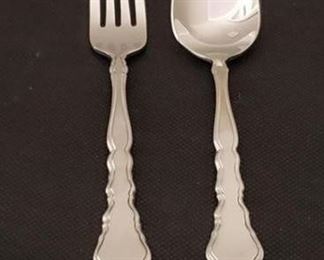 https://ctbids.com/#!/description/share/422450 "Satinique" Forks & Spoons By Oneida: 12 Spoons and 12 Forks. Subtle. Satiny. Sophisticated. This stainless flatware design inspires timeless beauty with its bright, delicately, sculpted border. A brushed, satin finish on the center panel contrasts nicely against the polished edges of the carved handle and the reflective tines and bowls. 18/10 Stainless Steel. Superb finish and pattern detail. Long lasting durability." 