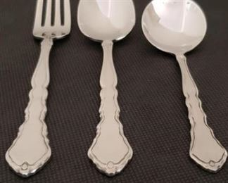 https://ctbids.com/#!/description/share/422382 "Satinique" Forks & Spoons By Oneida: 6 Soup Spoons, 6 Spoons and 6 Forks. "Subtle. Satiny. Sophisticated. This stainless flatware design inspires timeless beauty with its bright, delicately, sculpted border. A brushed, satin finish on the center panel contrasts nicely against the polished edges of the carved handle and the reflective tines and bowls. 18/10 Stainless Steel. Superb finish and pattern detail. Long lasting durability." 